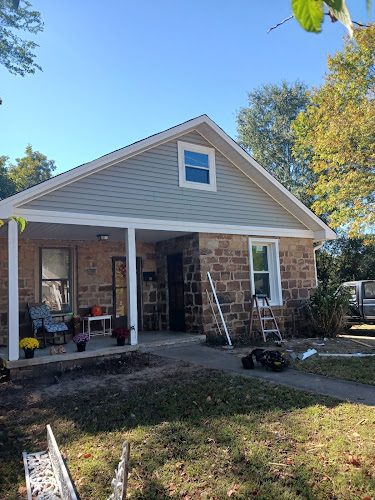 Custom Siding and Windows, Gutters